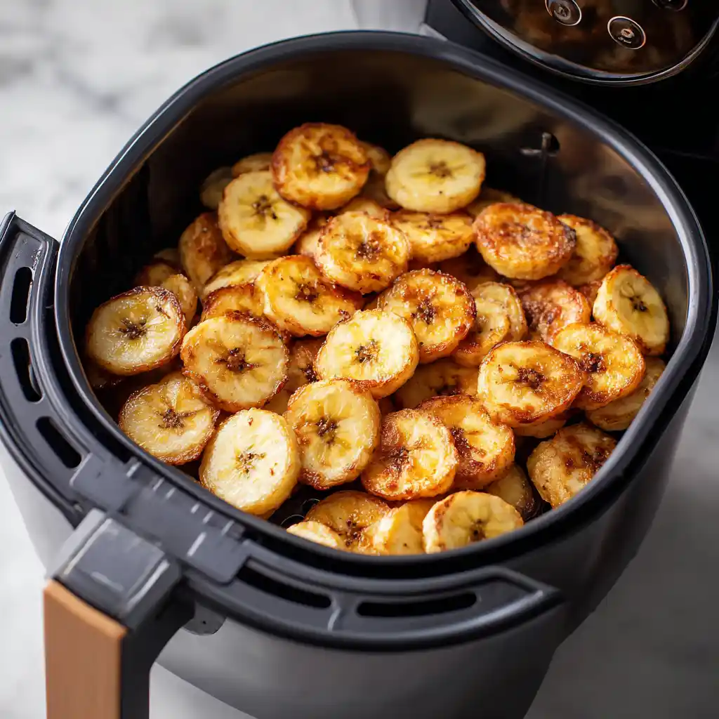 Air Fried Banana Chips – 5-Min Recipe with a Crispy Surprise 13 Crispy banana chips in fryer