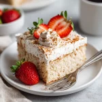 Vegan Tres Leches Cake – Amazing 3-Milk Recipe That Delights 7 Slice of vegan tres leches cake with strawberries and cinnamon
