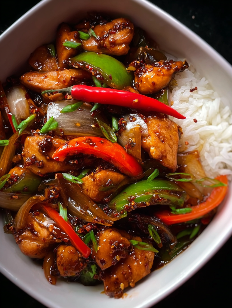 Bold Spicy Chicken Stir-Fry with Bell Peppers & Steamed Rice 1 Anass httpss.mj .runaA835PZWI3A Close up Shot Top view EMOTIO 8965e9d3 e654 4731 903c 86b116d0fb25 2