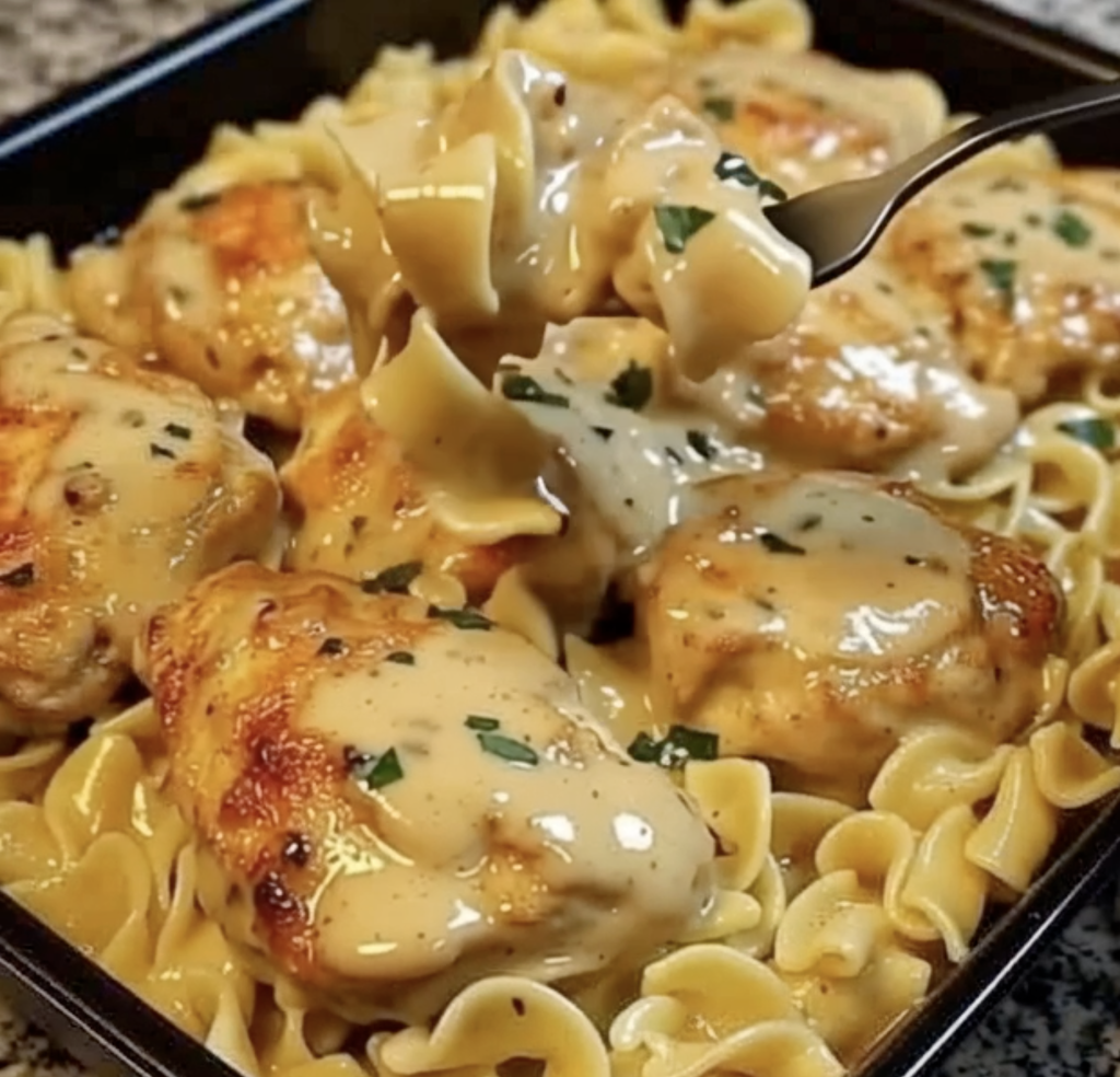Creamy Garlic Chicken Thighs Over Egg Noodles 1 Creamy Garlic Chicken Thighs Over Egg Noodles